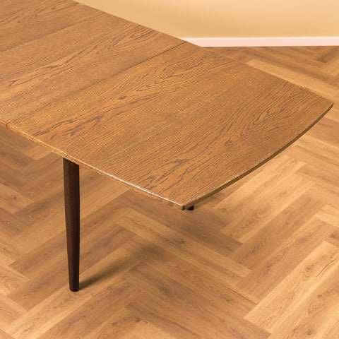 Danish dining table in stained oak