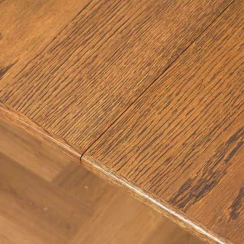 Danish dining table in stained oak