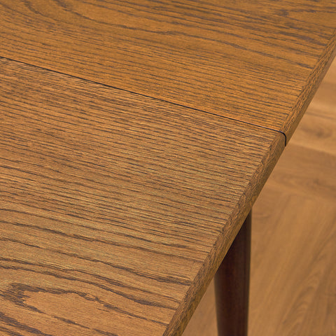 Danish dining table in stained oak
