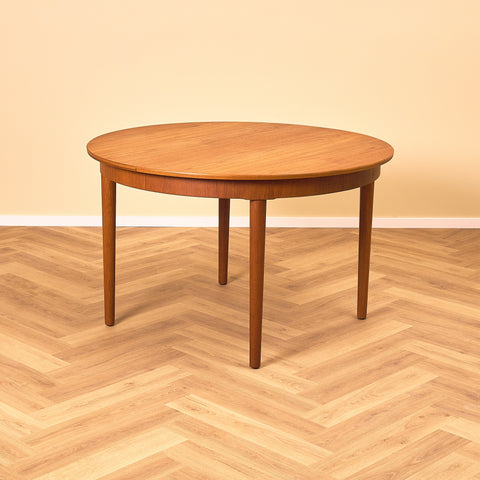 Danish round dining table in teak