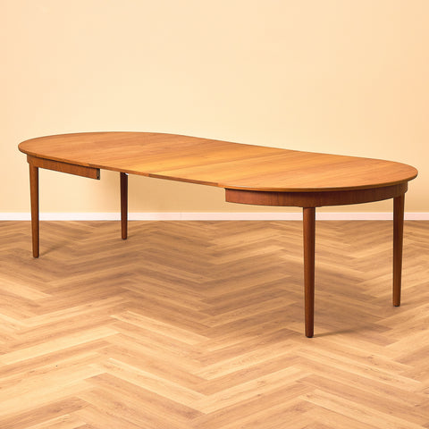 Danish round dining table in teak