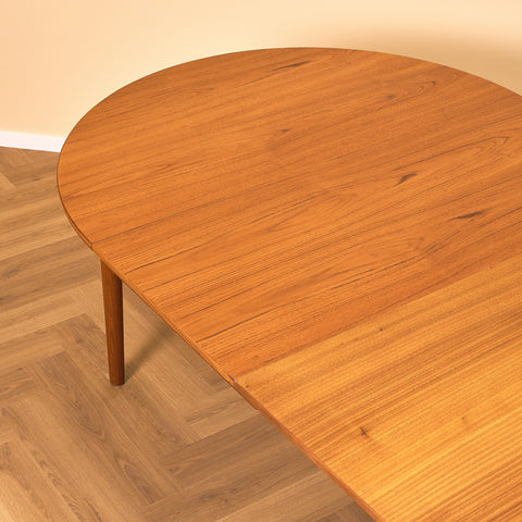 Danish round dining table in teak