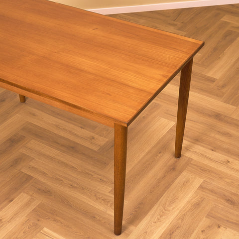 Danish dining table in teak and oak