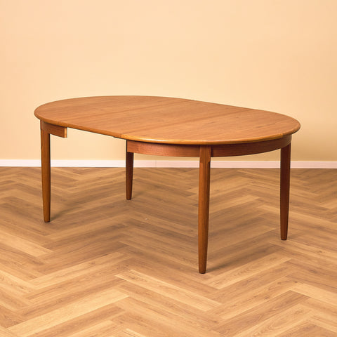 Danish round dining table in teak