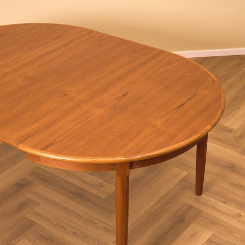 Danish round dining table in teak
