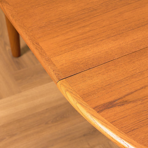 Danish round dining table in teak