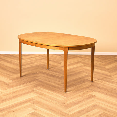 Swedish oval dining table in teak