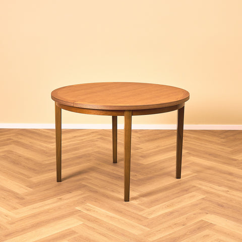 Swedish round dining table in teak and beech