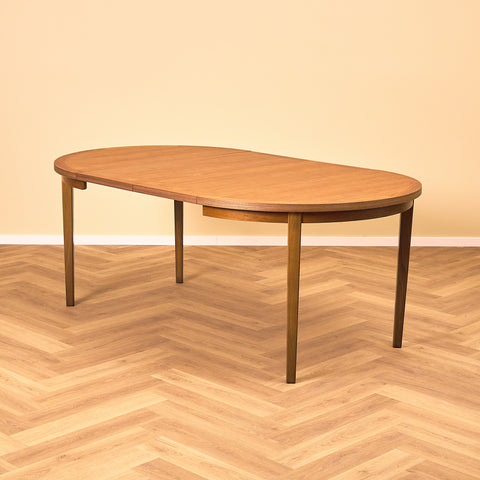 Swedish round dining table in teak and beech