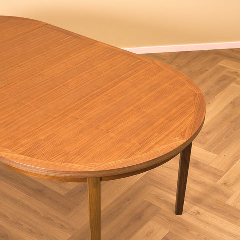Swedish round dining table in teak and beech