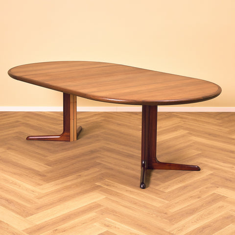 Danish round dining table in walnut & mahogany by Skovby