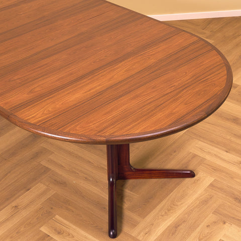 Danish round dining table in walnut & mahogany by Skovby