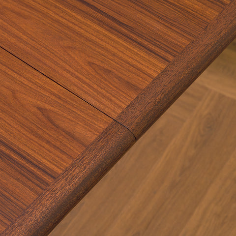 Danish round dining table in walnut & mahogany by Skovby