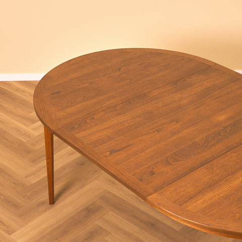 Swedish round dining table in teak