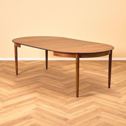 Danish round dining table in Santos rosewood
