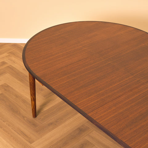 Danish round dining table in Santos rosewood