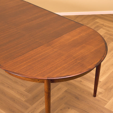 Danish round dining table in Santos rosewood