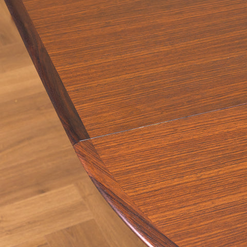 Danish round dining table in Santos rosewood
