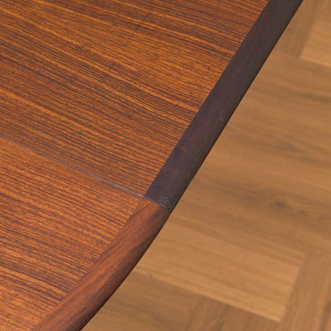 Danish round dining table in Santos rosewood