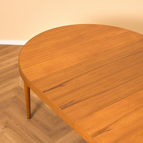 Danish round dining table in teak by Skovmand & Andersen for Moreddi