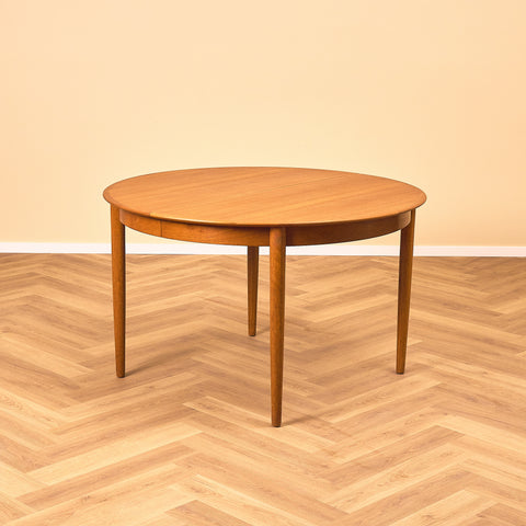 Danish round dining table in teak