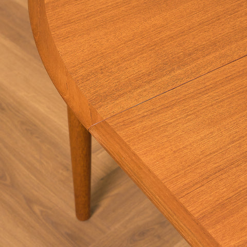 Danish round dining table in teak