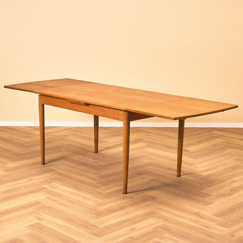 Danish dining table in teak and oak