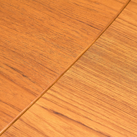 Danish dining table in teak and oak