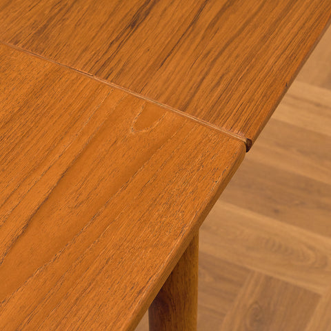 Danish dining table in teak and oak