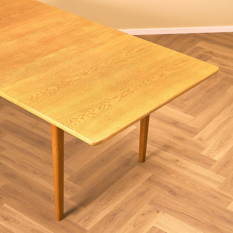 Swedish rectangular dining table in oak, model 'Calmare nyckel' by Carl Malmsten