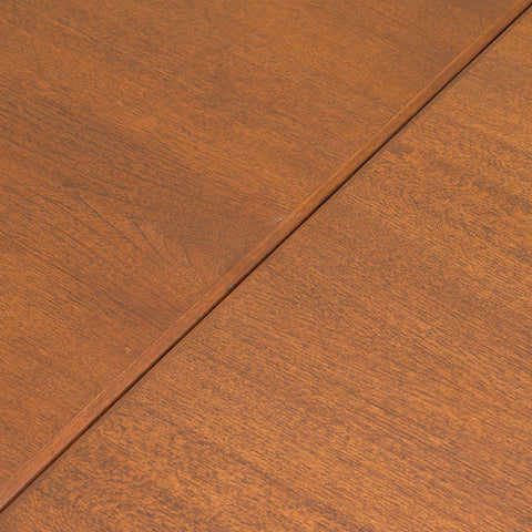 Danish dining table in teak and walnut