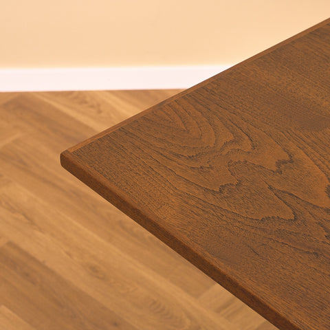 Danish dining table in teak and walnut