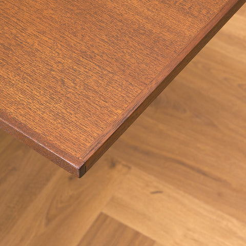 Danish dining table in teak and walnut