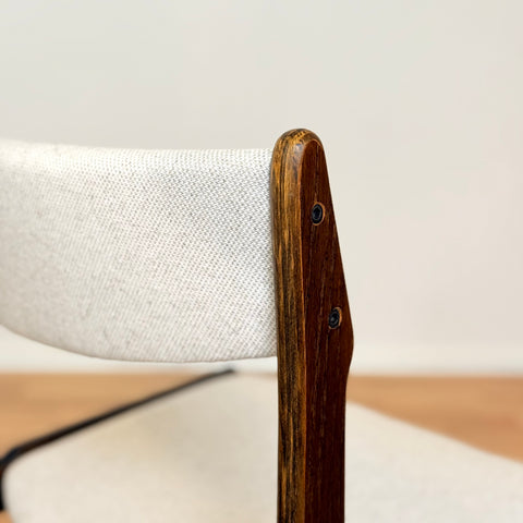 Danish dining chairs in solid stained oak by Erik Buch