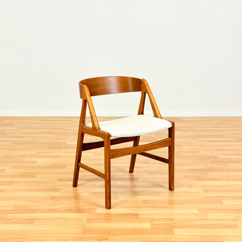 Danish single dining chair in teak by Henning Kjærnulf