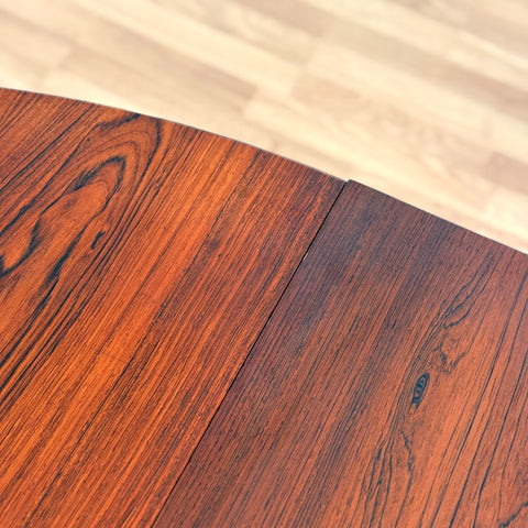 Danish round dining table in Santos rosewood