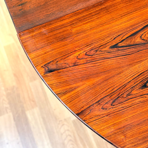 Danish round dining table in Santos rosewood