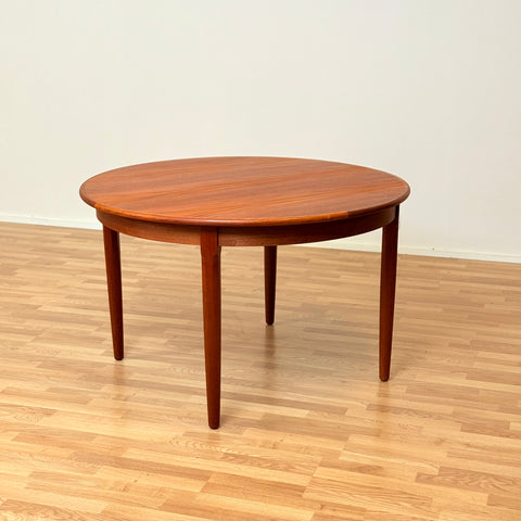 Danish round dining table in teak