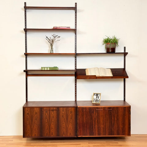 Danish wall unit in Santos rosewood by Kai Kristiansen, for FM Mobler