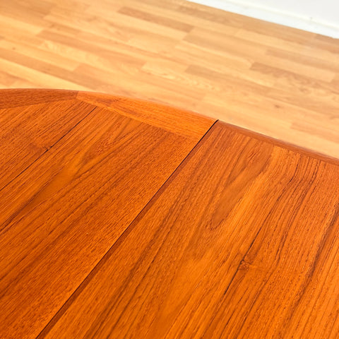 Large danish round dining table in teak