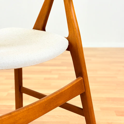 Danish single dining chair in teak by Henning Kjærnulf