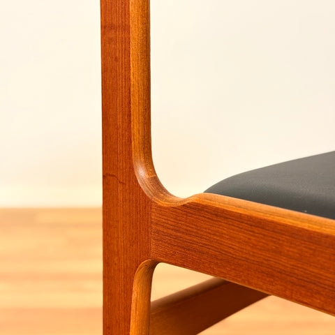 Danish dining chairs in teak by Erik Buch