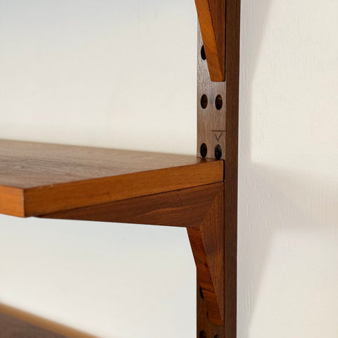 Danish wall unit / shelving system in walnut by Poul Cadovius
