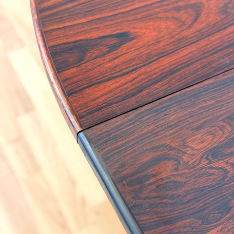 Danish round dining table in Santos rosewood