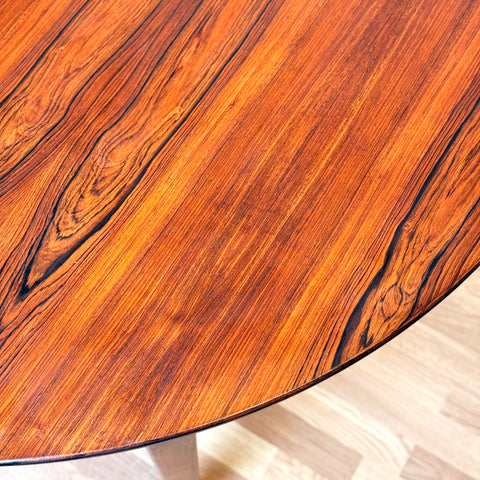 Danish round dining table in Santos rosewood
