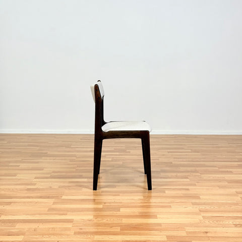 Danish dining chairs in solid stained oak by Erik Buch