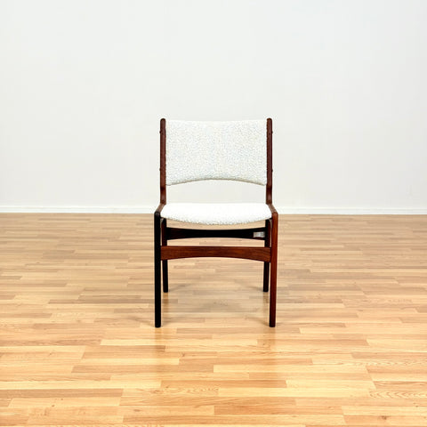 Danish dining chairs in solid walnut by Erik Buch