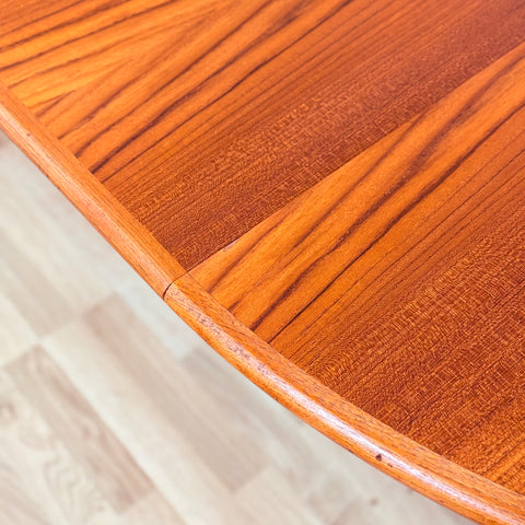 Danish round dining table in teak