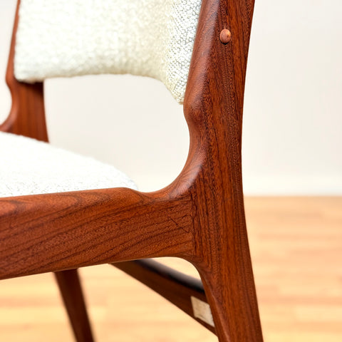 Danish dining chairs in solid walnut by Erik Buch