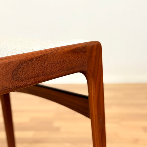 Danish dining chairs in solid walnut by Erik Buch